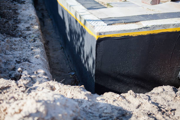 Professional Waterproofing technician working in Lakewood, WA
